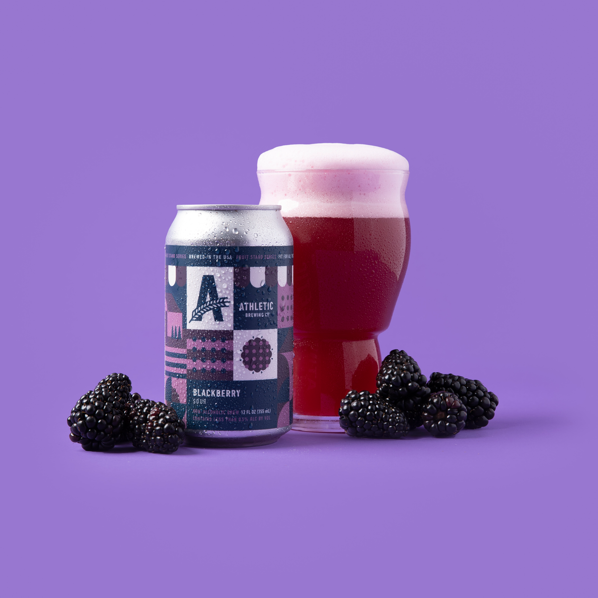 Blackberry Sour can and poured glass with fresh blackberries.