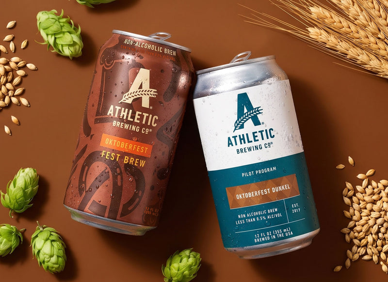 oktoberfest and dunkel on brown background surrounded by ingredients