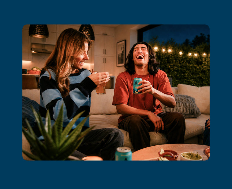 people enjoying brews in living room